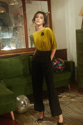 Soft velvet blouse with 3/4 sleeves and gathered waistline for elegant evening styling